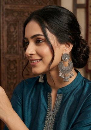 "This is a pair of oxidised silver chandbali earrings"